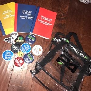 Herbalife training note books and 10 buttons